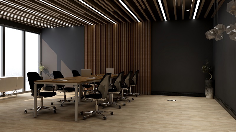 sala de reuniões com mesa grande para oito cadeiras, decorada com pisos vinílicos para ambientes corporativos